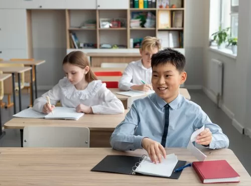 Freepik Assets "Free photo medium shot kids sitting at school"