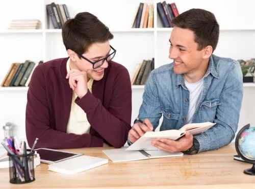 Freepik Assets "Free photo smiling students reading book"